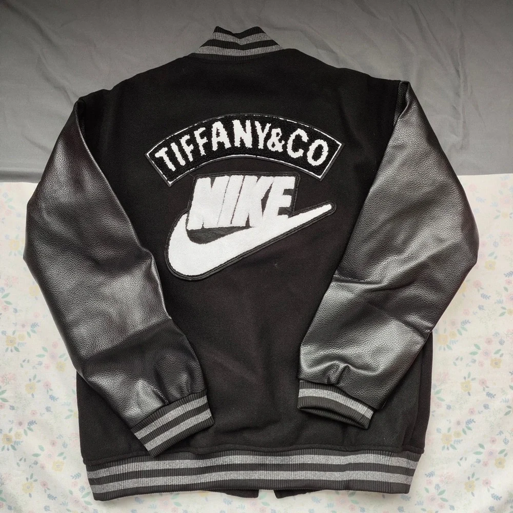 Nike Black Varsity Jacket with Mint Accents